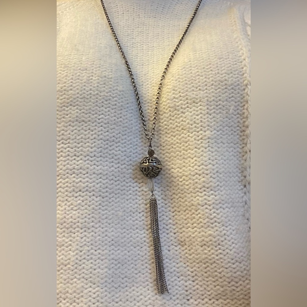 Silpada silver tassel necklace with smoky and clear quartz stones.